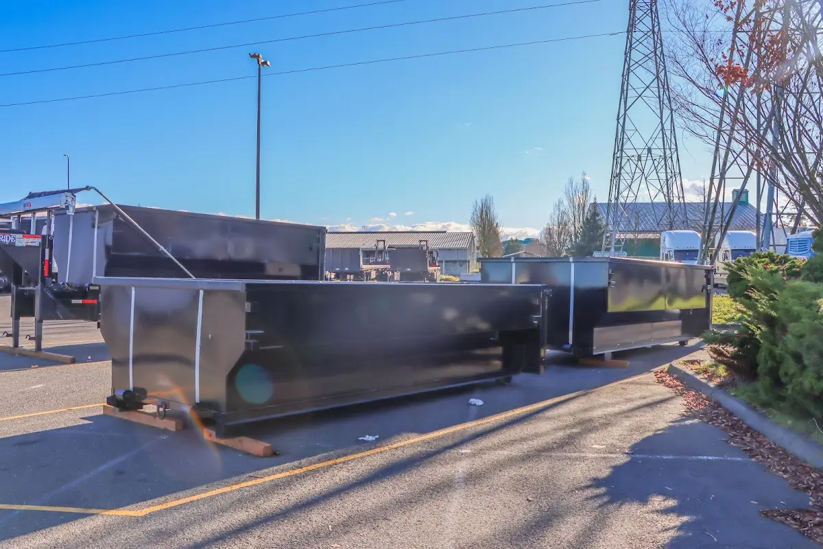 Roll-off dumpster ready for waste disposal at job site for Yard Waste Dumpster Rental in Pantops